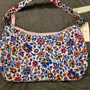 Vera Bradley Mini bags could be used for many things selling both for one price.